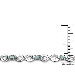 Sterling Silver Oval-cut Blue Topaz Cross-over Heart Link Bracelet