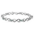 Sterling Silver Oval-cut Blue Topaz Cross-over Heart Link Bracelet