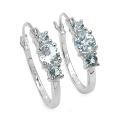 Sterling Silver Round-cut Blue Topaz 3-stone Hoop Earrings