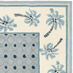 Hand-hooked Chelsea Resorts Blue Wool Rug (3'9 x 5'9)