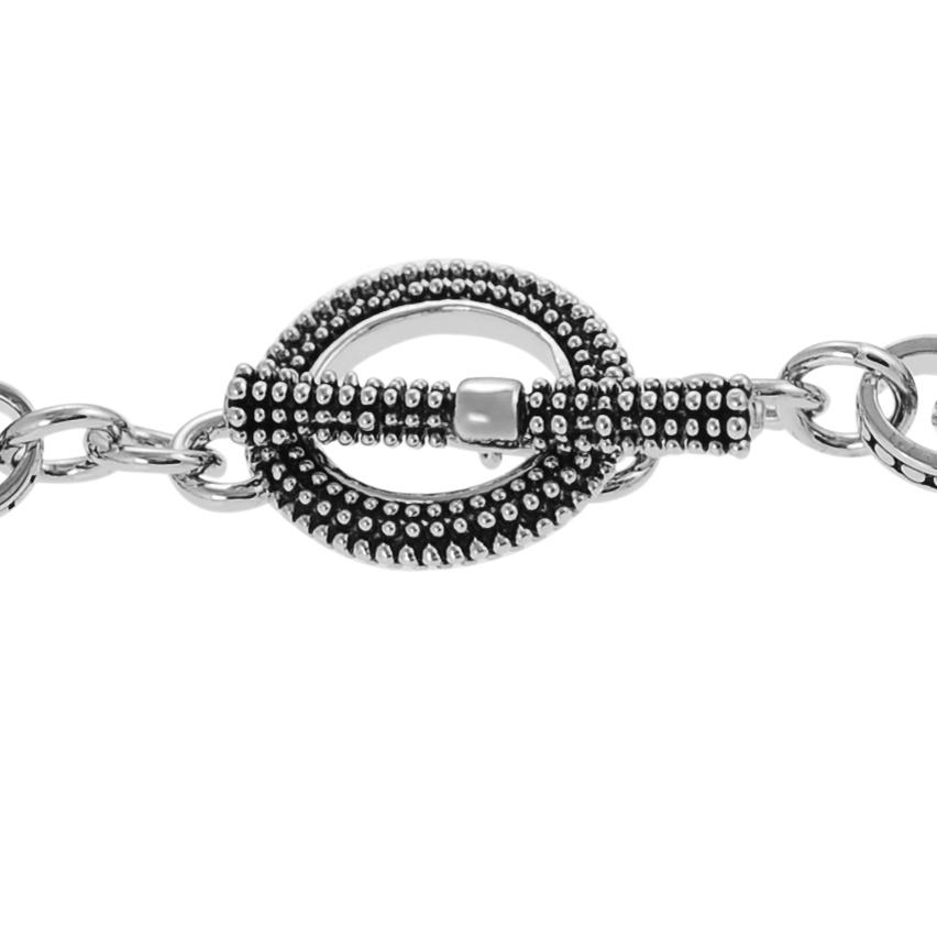 Journee Collection Two-tone Oval-cut CZ Hammered Bracelet