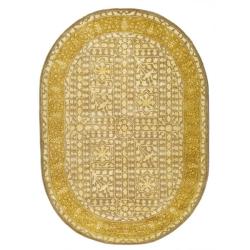 Handmade Majestic Beige/ Light Gold Wool Rug (4'6 x 6'6 Oval)