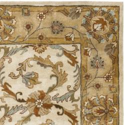 Handmade Heritage Zabol Beige/ Gold Wool Rug (6' x 9')