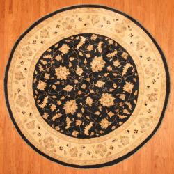 Afghan Hand-knotted Vegetable Dye Black/ Ivory Wool Rug (10' Round)
