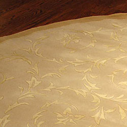 Handmade Floral Scrolls Ivory Wool and Silk Rug (8' Round)