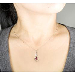 18k White Gold 3/8 carat TDW Pear Shaped Ruby and Diamond Pendant (G-H, SI)
