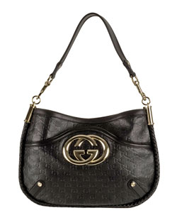 Gucci Embossed Logo Medium Leather Handbags