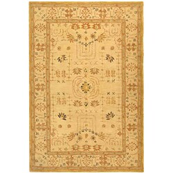 Handmade Treasured Sand Wool Rug (5' x 8')
