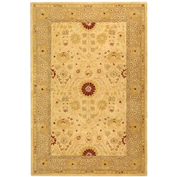 Handmade Timeless Ivory/ Sand Wool Rug (9' x 12')
