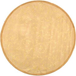 Handmade Floral Scrolls Ivory Wool and Silk Rug (8' Round)