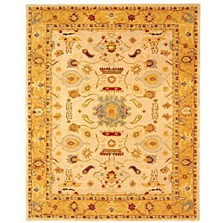 Handmade Tribal Ivory/ Gold Wool Rug (12' x 15')
