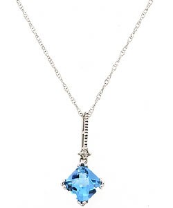 14k White Gold Blue Topaz Pendant