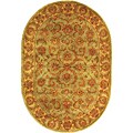 Handmade Heritage Kermansha Green/ Gold Wool Rug (4'6 x 6'6 Oval)