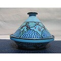 Sabrine Serving Tajine (Tunisia)
