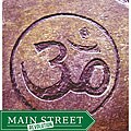 Hand-Carved Natural Stone 'Om' Circle Inspirational Art