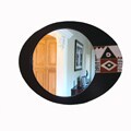 Wood and Glass Beauty Reflections Eye Mirror (Ghana)