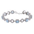 Glitzy Rocks Sterling Silver 8 CTW Blue Topaz and Diamond Accent Bracelet