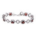 Glitzy Rocks Sterling Silver 8 CTW Garnet and Diamond Accent Bracelet