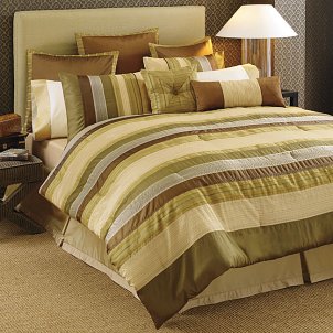 A bedroom comforter set in pleasant earth tones
