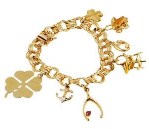 Gold charm bracelet with good luck charms