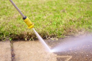 A power washer makes quick work of dirt
