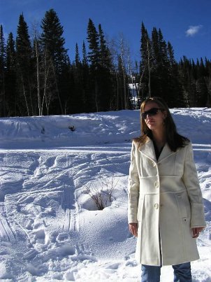 Woman in white, wool coat