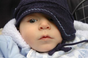 Cute baby boy in an infant car seat