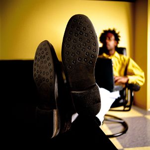 Man wearing freshly shined shoes
