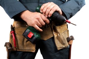 Man holding cordless drill