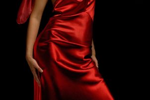 Woman in red satin dress