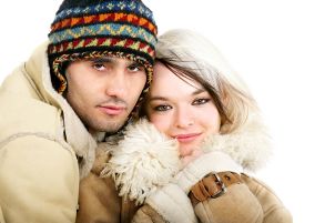 Couple wearing suede coats