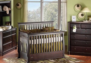 Dark brown crib in nursery furniture set