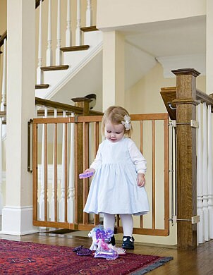 Child in front of safety gate