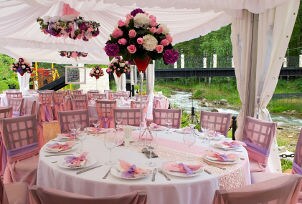 Wedding tables decorated for outdoor reception