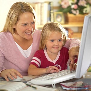 Mom and daughter playing with an educational toy