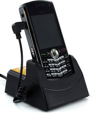 Handset charging in a cell phone charger cradle