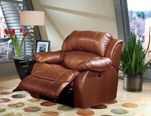 large brown leather recliner with red tulips and rug