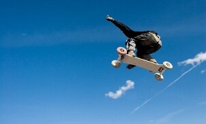 Man riding a mountain board