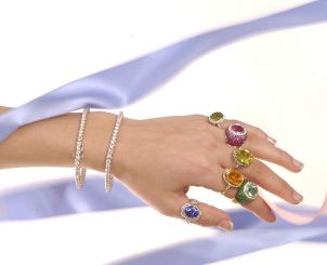 Woman wearing tourmaline rings