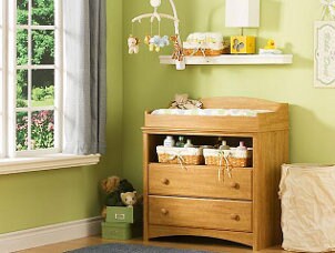 Cute changing table in a baby nursery