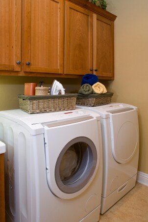 Organized laundry room with a washer and dryer combo