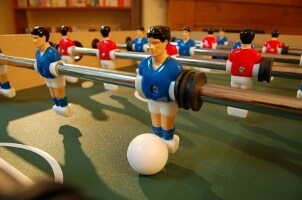 Close up of a foosball table