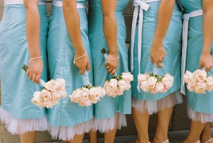Bridesmaids wearing matching dresses at a wedding