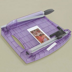 Purple paper trimmer cutting photos