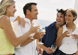 Wedding party relaxing with drinks