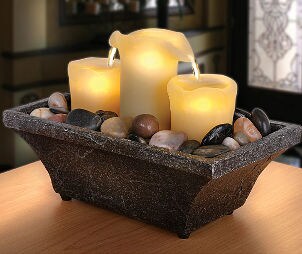 Centerpiece with candles and polished rocks