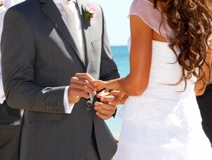 Bride and groom exchange rings