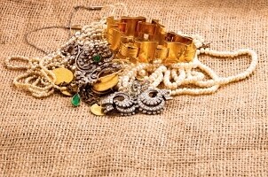 Pile of jewelry needs to be stored in a jewelry armoire