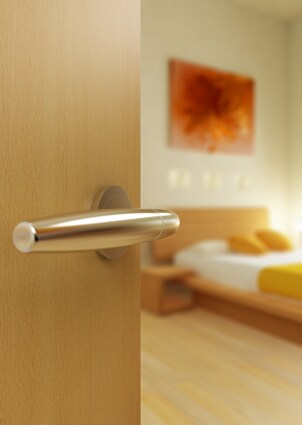 Bedroom door with modern door hardware
