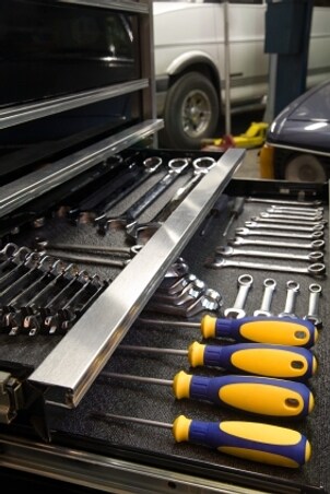 Garage tool organizer full of auto tools